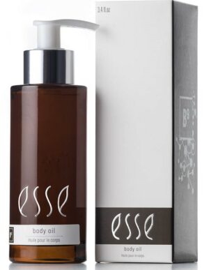 A brown bottle of Esse Body Oil Gift with a white pump sits next to its matching white and grey box. The bottle has white text reading "Esse Body Oil," and the box displays similar text and design elements. The bottle contains 3.4 fl oz of body oil.